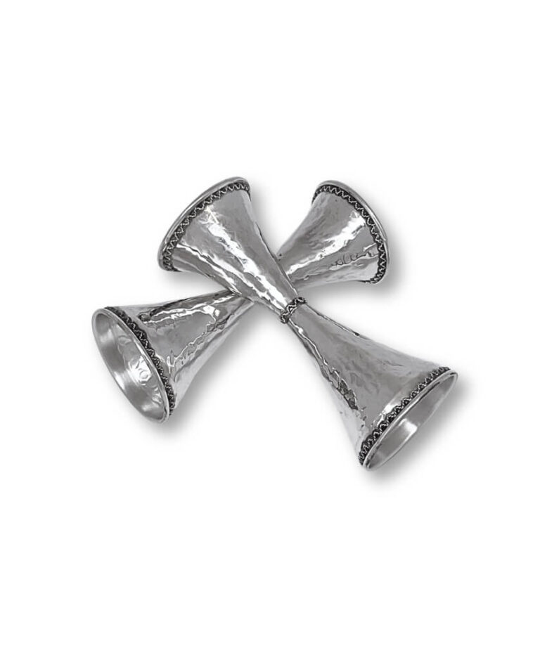 Diagonal arrangement of hammered silver candlesticks with artistic curves