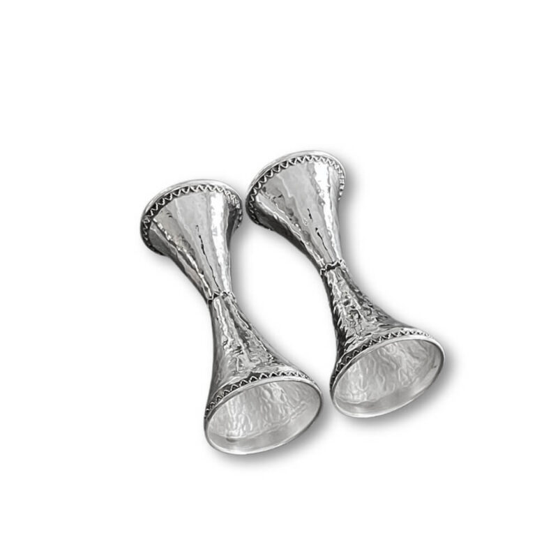 Bottom perspective of silver candle holders showing flared base detailing