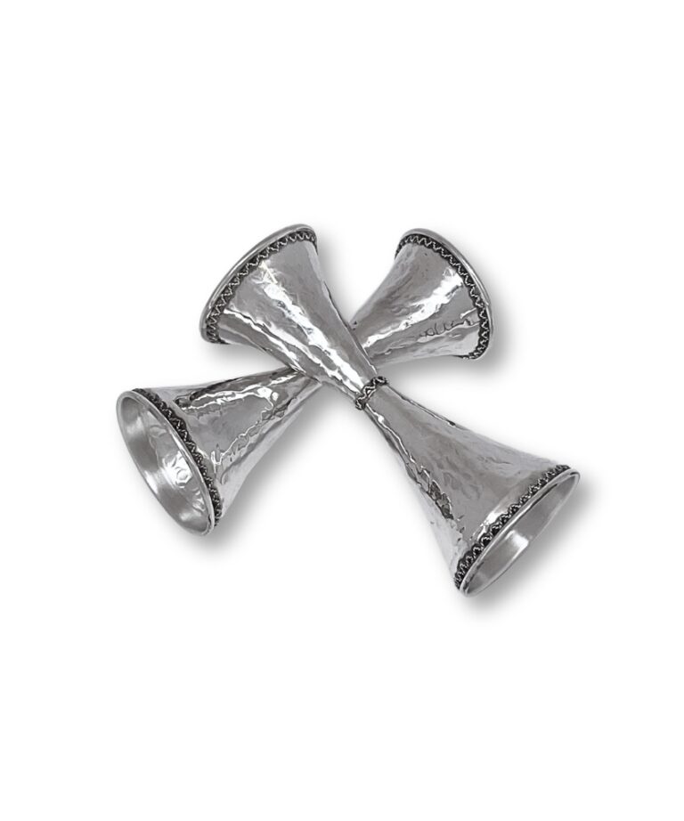 Diagonal arrangement of hammered silver candlesticks with artistic curves