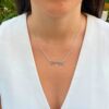 14K Solid Gold Hebrew Name Necklace worn outdoors with white blouse