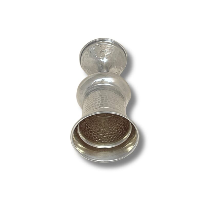 Top-down view showing the hammered texture of the cup’s bowl