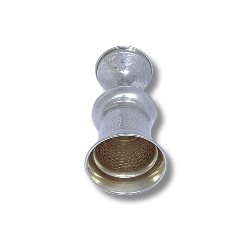 Top-down view showing the hammered texture of the cup’s bowl