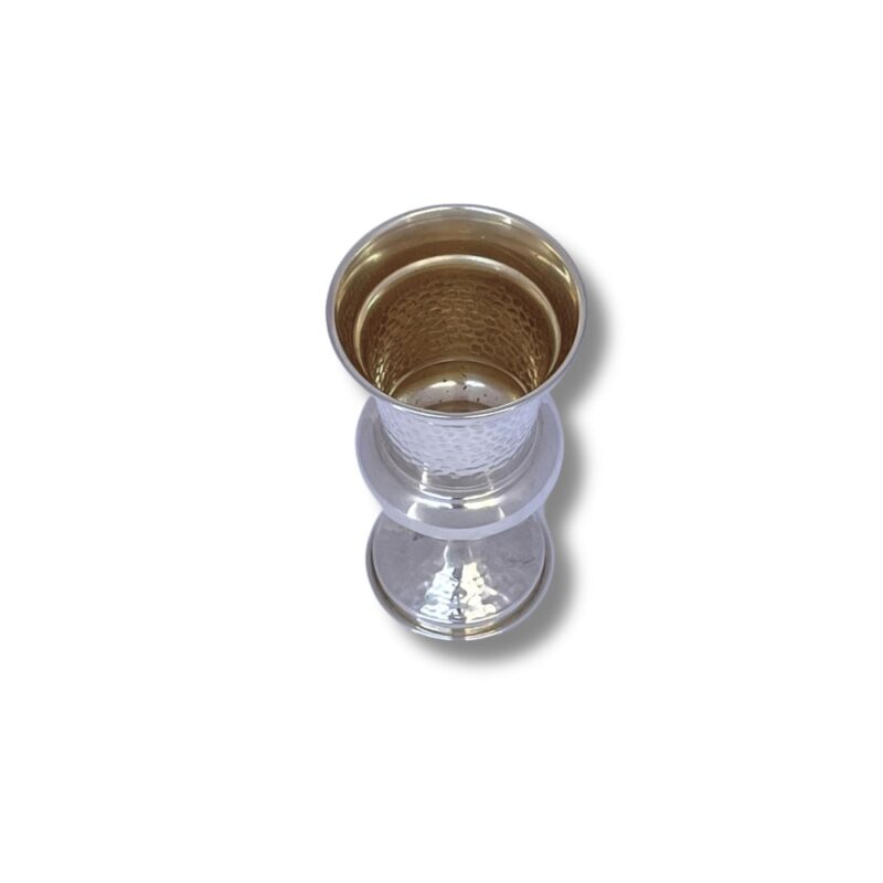 Overhead close-up of cup interior with gold-tone finish