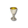 Hammered silver goblet with a rounded base and golden interior