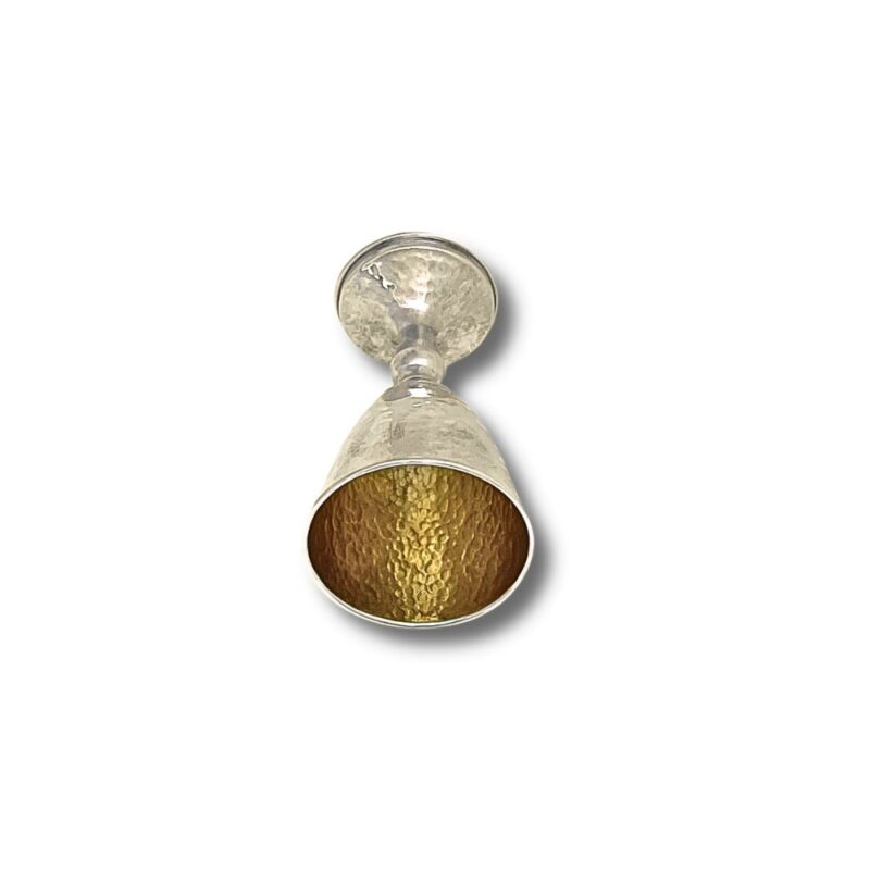 Interior view of the Kiddush Cup showing golden hammered finish