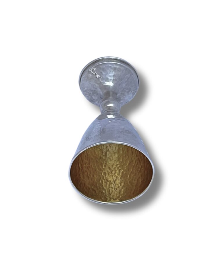 Interior view of the Kiddush Cup showing golden hammered finish