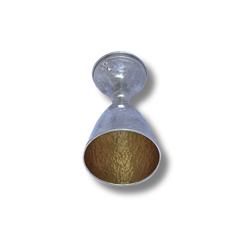 Interior view of the Kiddush Cup showing golden hammered finish