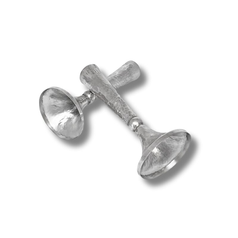 Angled display of hammered silver Shabbat candlesticks