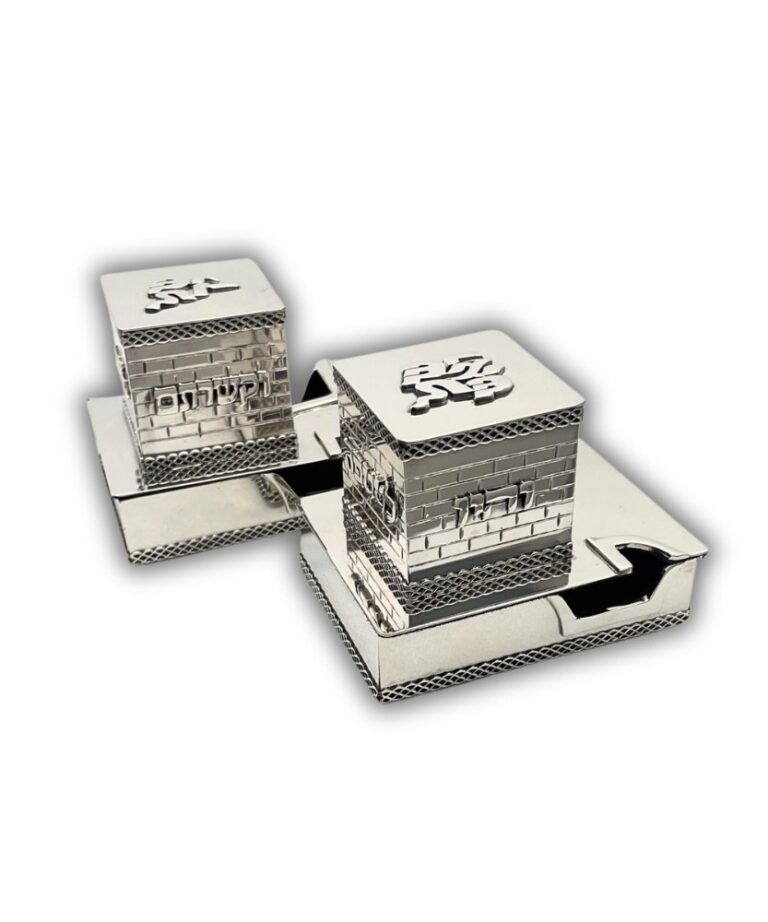 Pair of silver tefillin boxes with reflective finish and handcrafted engraving