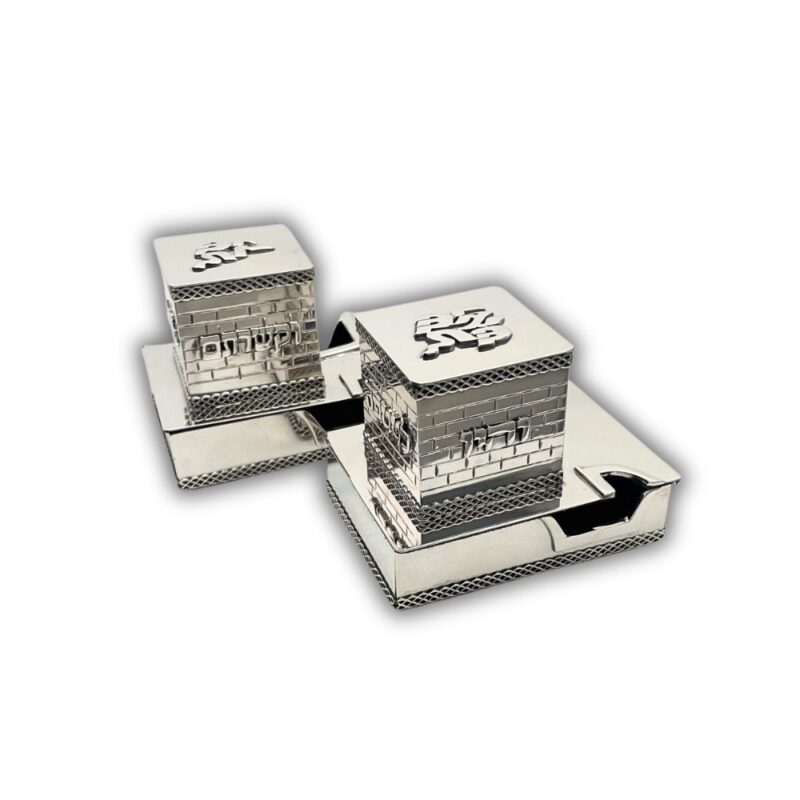 Pair of silver tefillin boxes with reflective finish and handcrafted engraving