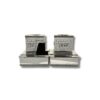 Elegant silver Judaica boxes featuring traditional Hebrew words and wall-like texture