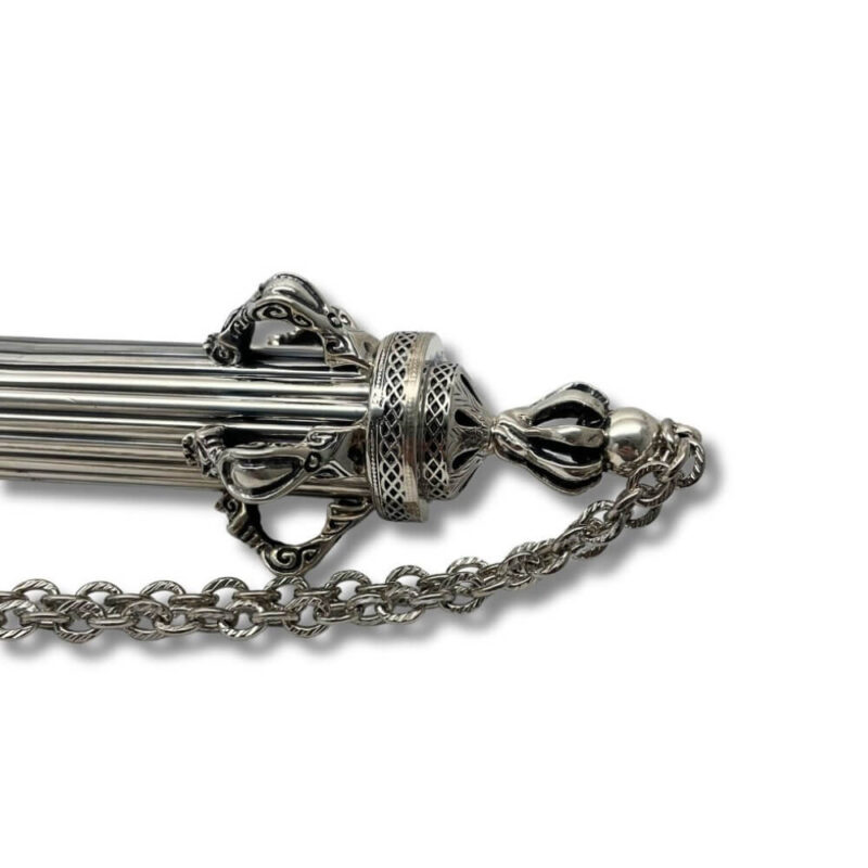 Detailed view of the base and chain of a Yad Torah