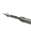 Close-up of ornate torah pointer tip with intricate design