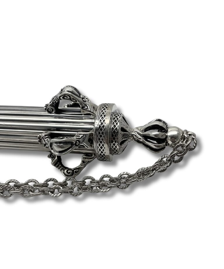Detailed view of the base and chain of a Yad Torah