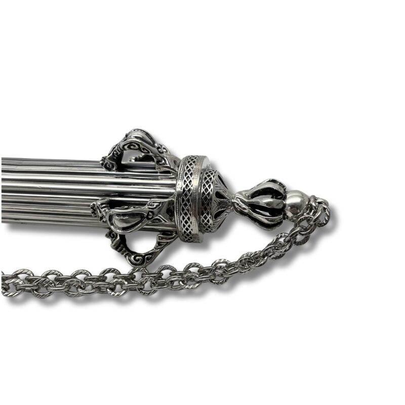 Detailed view of the base and chain of a Yad Torah