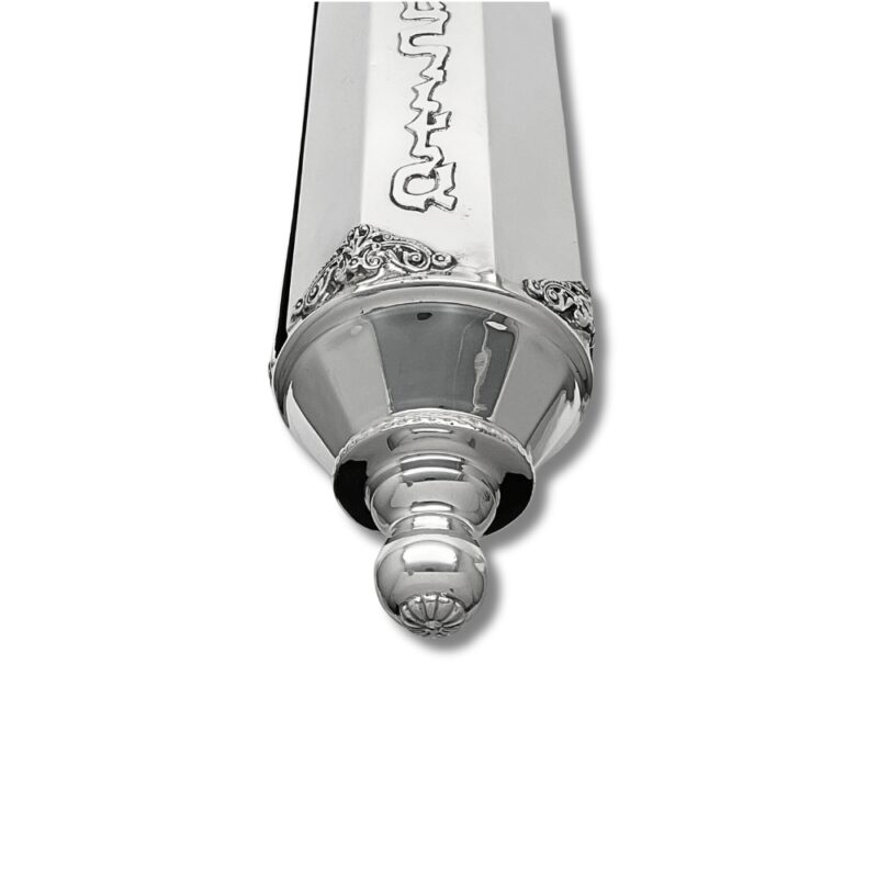 Decorative finial of handcrafted silver scroll case with filigree-style accents