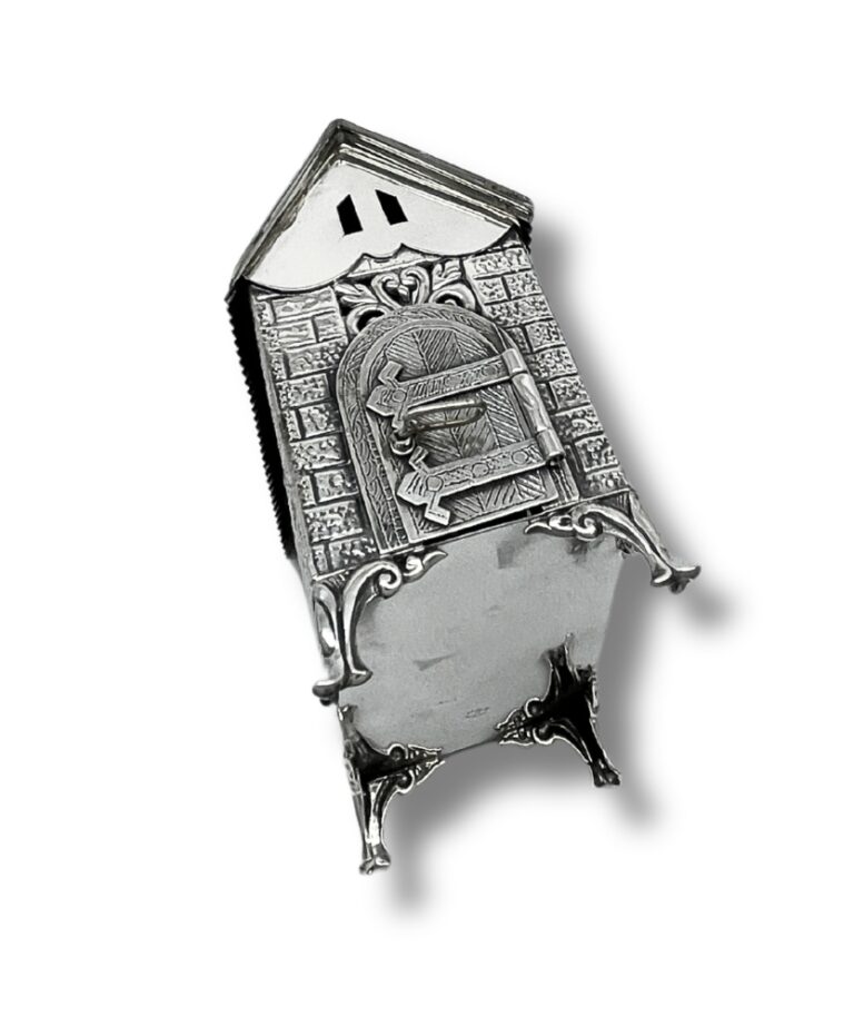 Top view of side Tzedakah box showing door close roof design