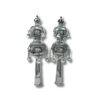 Handcrafted silver Torah finials with intricate decorations and bells