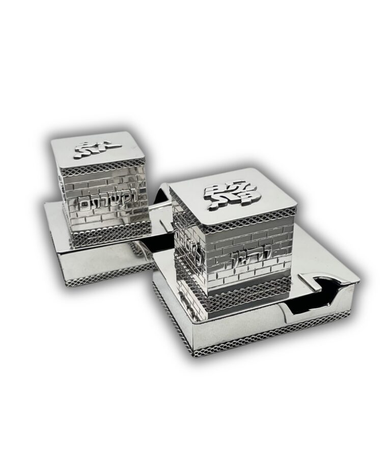 Pair of silver tefillin boxes with reflective finish and handcrafted engraving