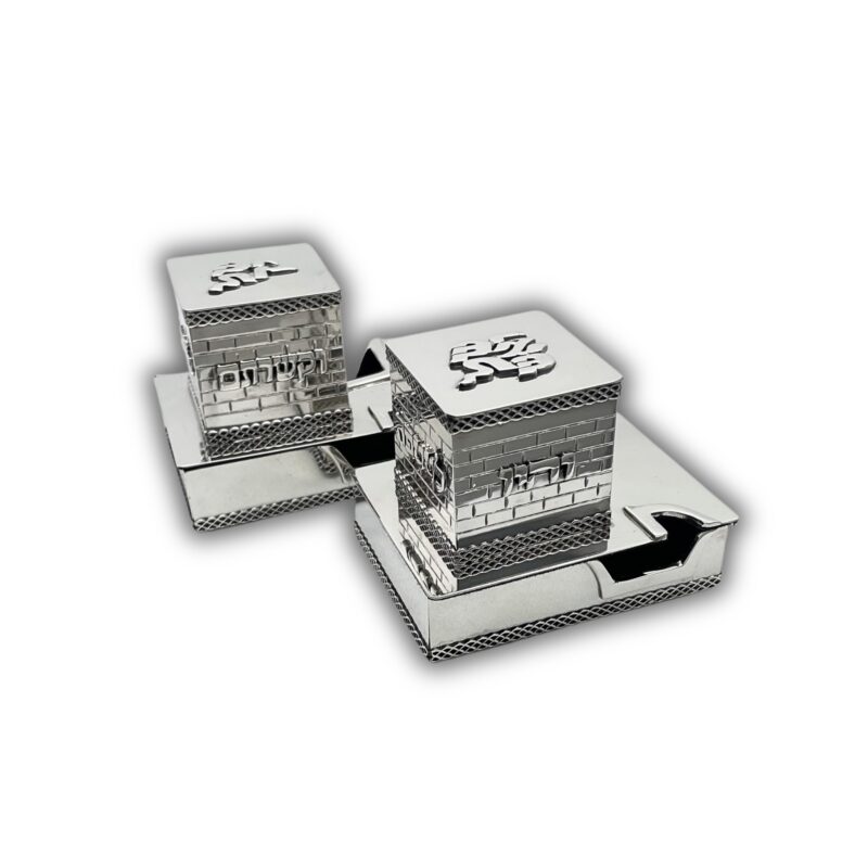 Pair of silver tefillin boxes with reflective finish and handcrafted engraving