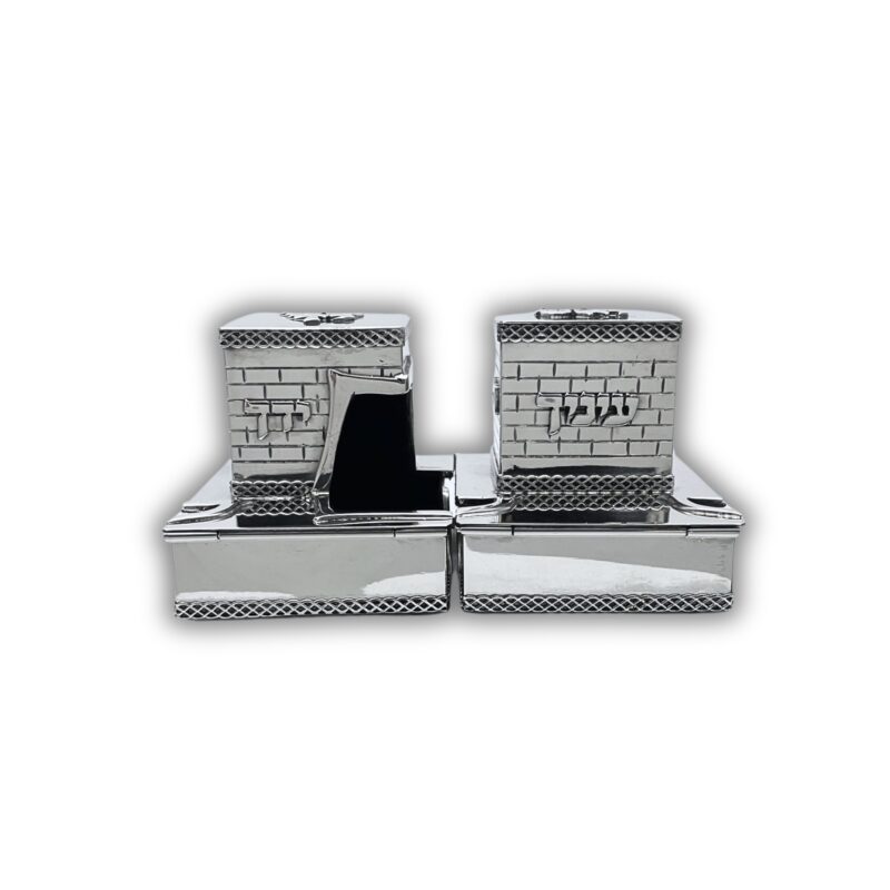 Elegant silver Judaica boxes featuring traditional Hebrew words and wall-like texture