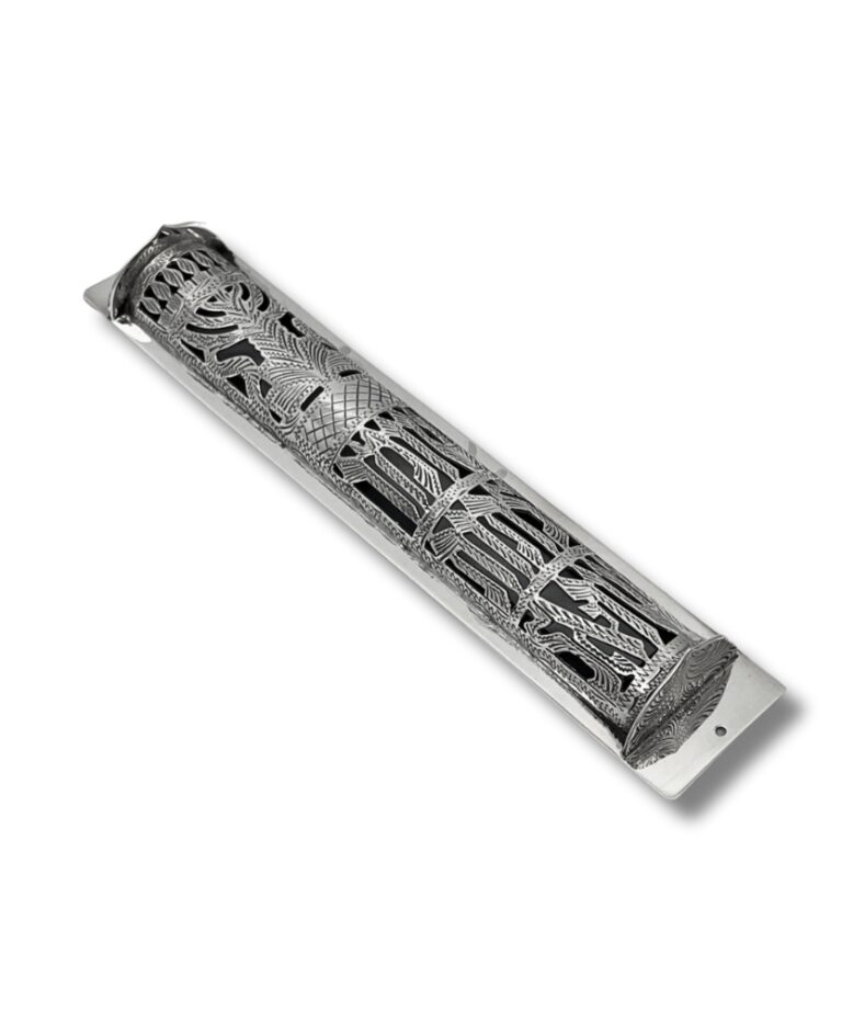 Angled top view of handcrafted silver mezuzah with intricate openwork pattern