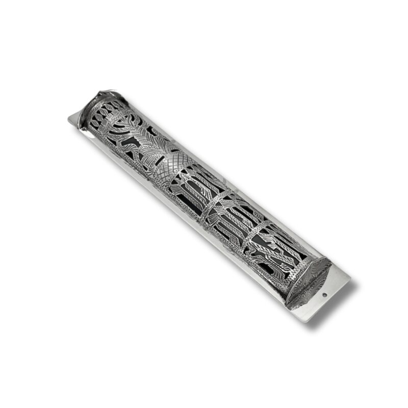 Angled top view of handcrafted silver mezuzah with intricate openwork pattern