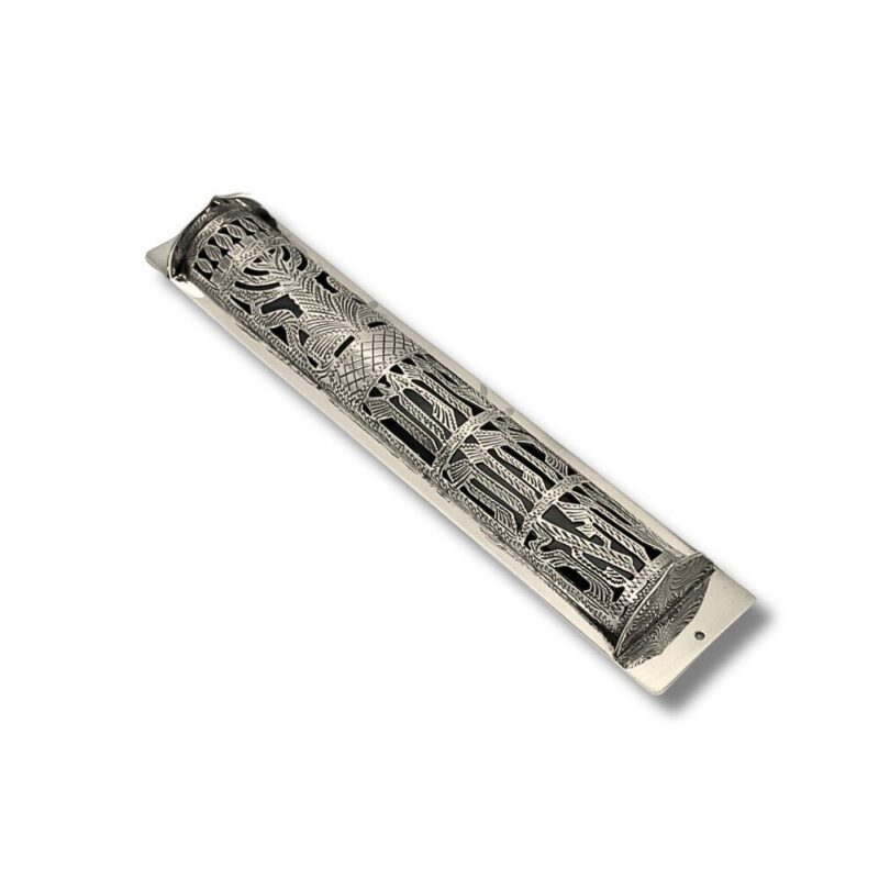 Angled top view of handcrafted silver mezuzah with intricate openwork pattern