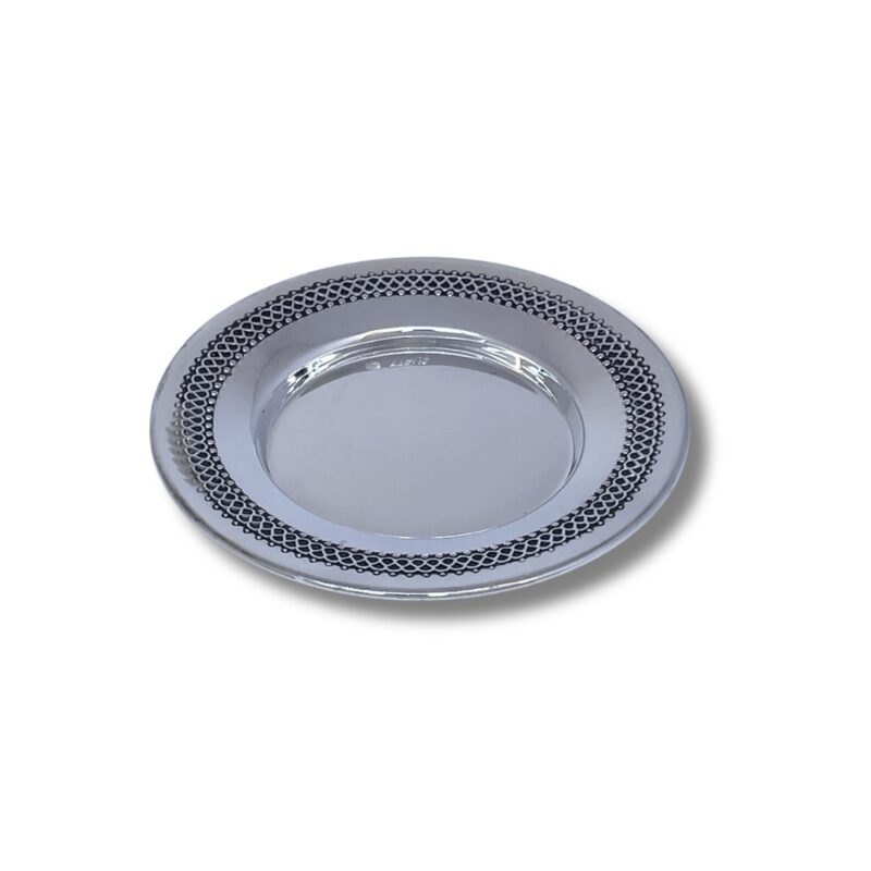 Detailed view of silver Kiddush plate with handcrafted filigree design