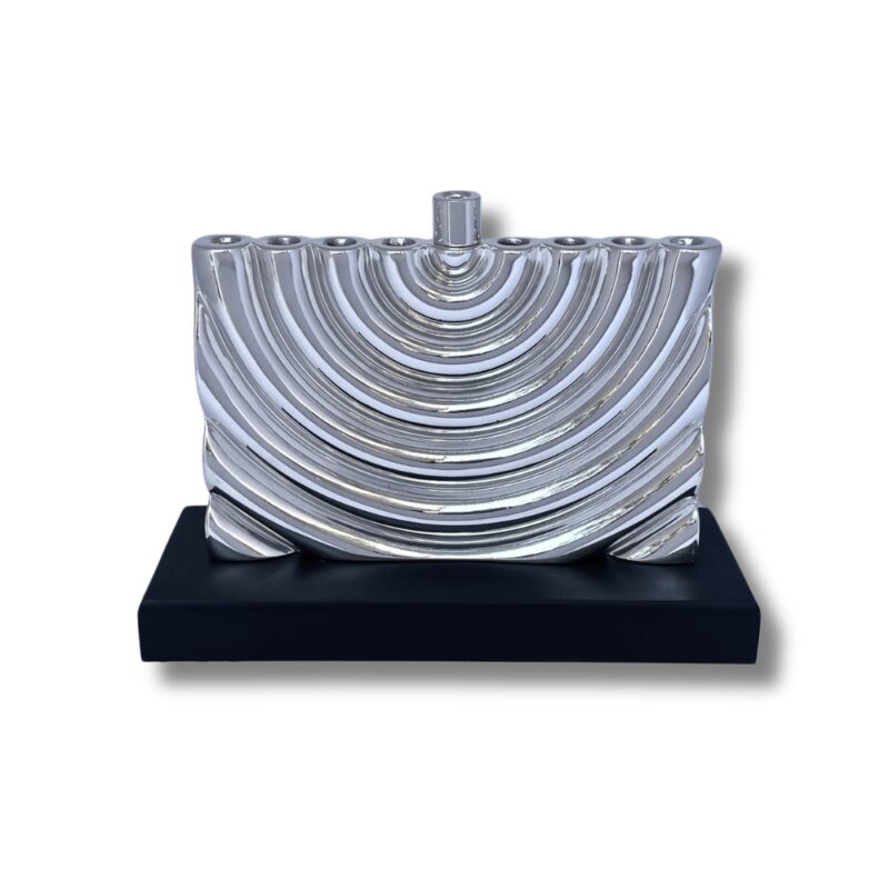 Sterling Silver Hanukkah Menorah front-facing on a black wooden platform