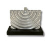 Sterling Silver Hanukkah Menorah front-facing on a black wooden platform