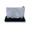 Front view of curved silver menorah with smooth finish and solid base