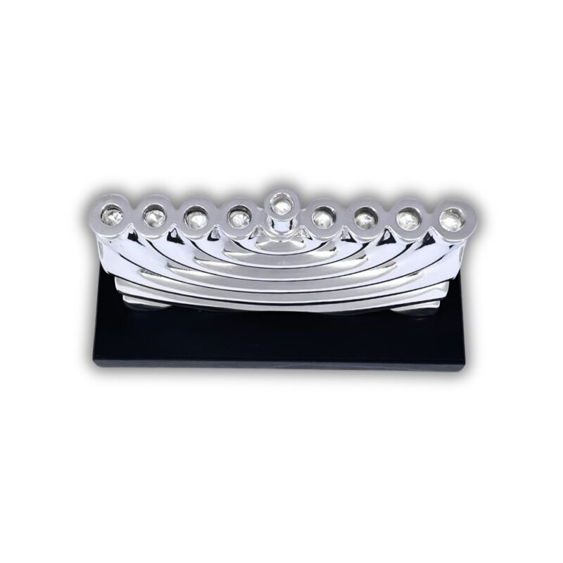 Top-down view showing the nine candle holders in precise alignment