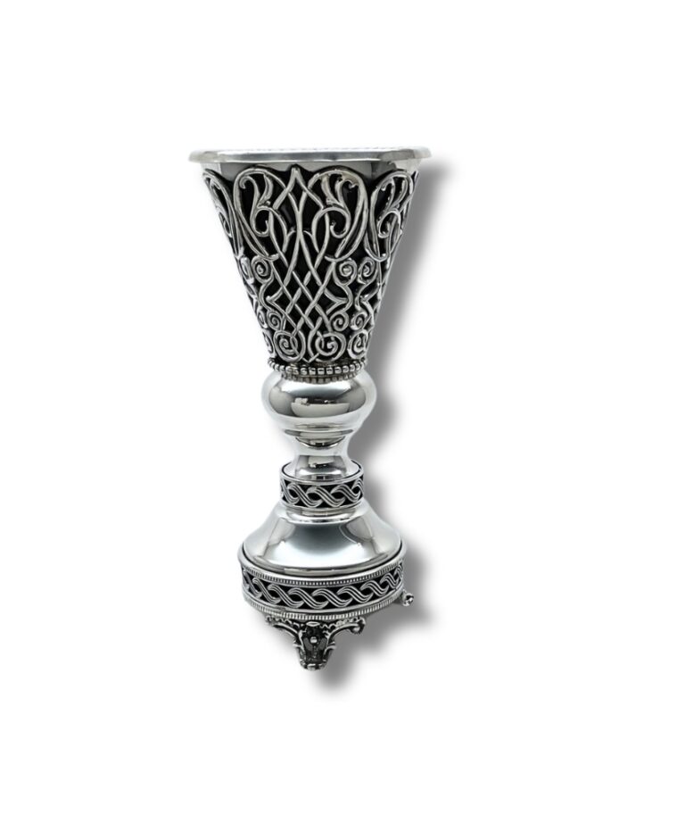 Detailed view of the top cone of the Havdalah Candle Holder, featuring intricate swirling filigree design with a polished silver ring at the base
