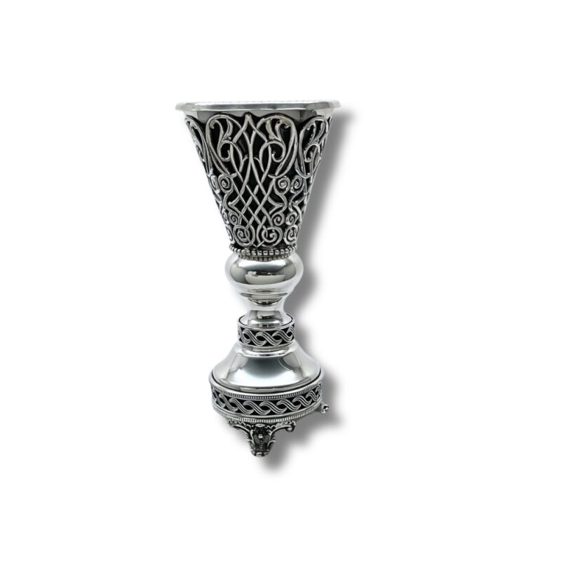 Detailed view of the top cone of the Havdalah Candle Holder, featuring intricate swirling filigree design with a polished silver ring at the base
