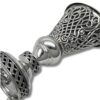 Close-up of the Havdalah Candle Holder’s mid-section, focusing on the smooth silver ball joint and the ornate wavy filigree patterns on the connected bands