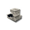 Top-down angle of silver tefillin box with bold “יד” engraving and ornate surface