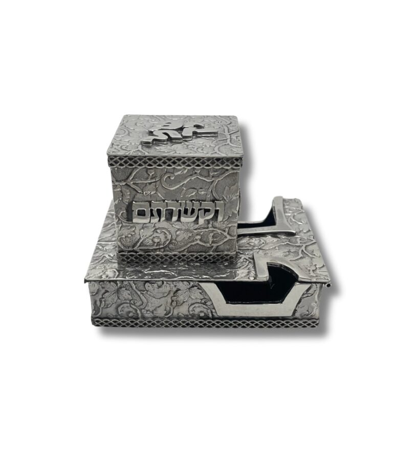 Back view of tefillin boxes showing Hebrew inscription 