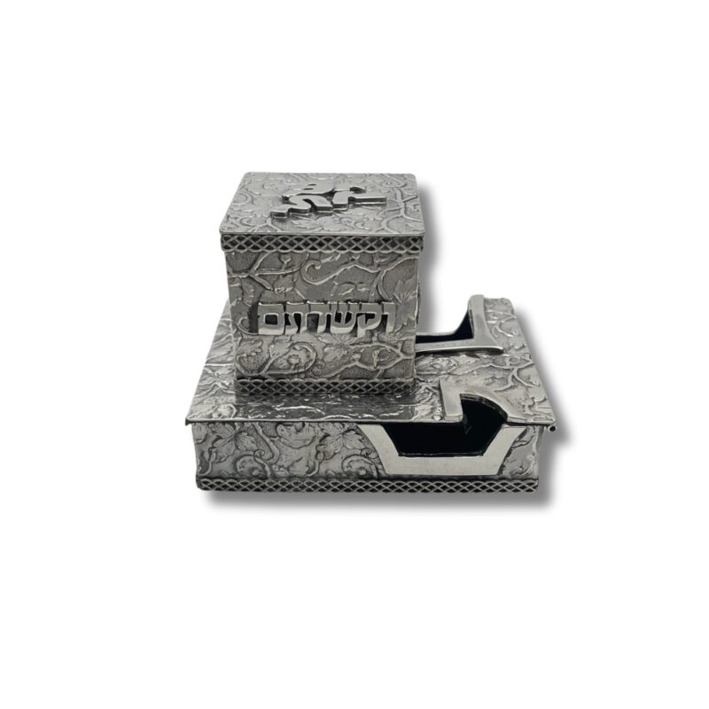 Back view of tefillin boxes showing Hebrew inscription "וקשרתם"