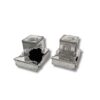 Open view of silver tefillin boxes showcasing interior detail and unique architectural style