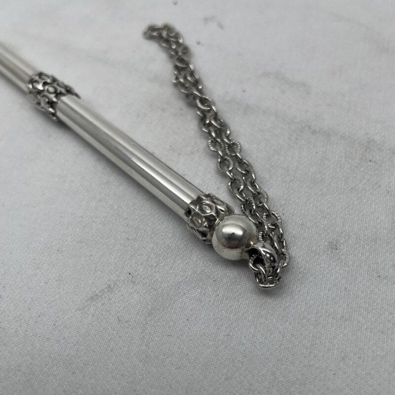 "Sterling silver chain attached to yad Torah