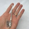925 Silver Torah Pointer with chain displayed on a hand
