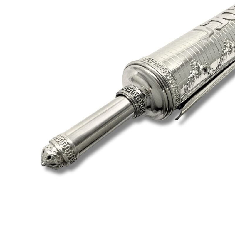 Rotating handle of a large silver scroll case for Megillat Esther