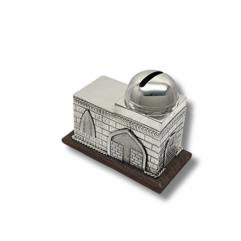 Detailed view of a silver charity box with arched windows and a rounded lid