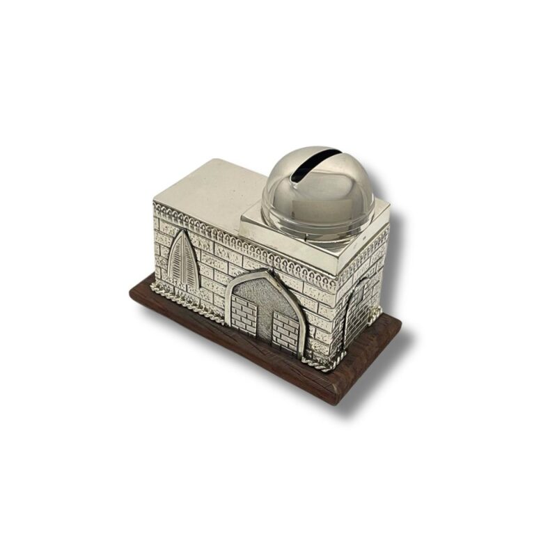 Detailed view of a silver charity box with arched windows and a rounded lid