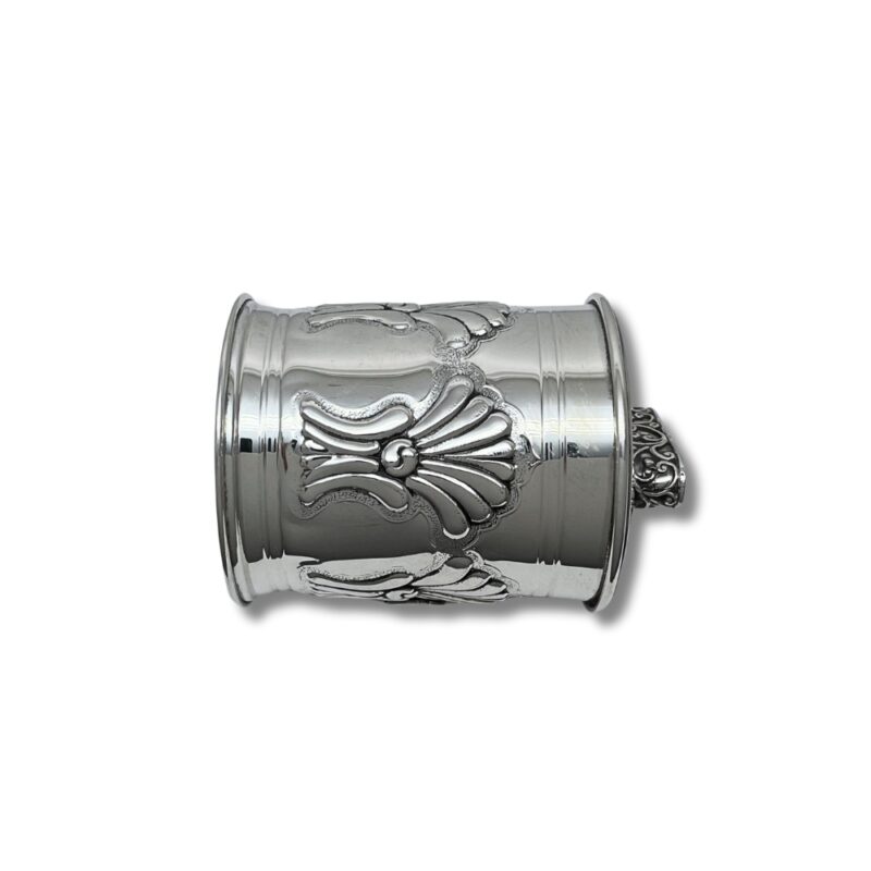 Close-up of floral patterns and fine silver details on handmade Tzedakah Box from Jerusalem.