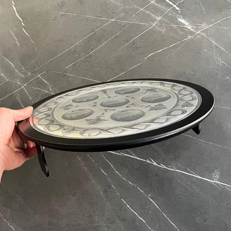 Side view of the 925 Silver Passover Seder Plate showing the engraved surface and black wood base