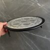Side view of the 925 Silver Passover Seder Plate showing the engraved surface and black wood base