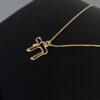 14K Gold Chai Necklace on black display – minimalist outline design