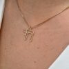 Close-up of 14K Gold Chai Necklace with Hebrew outline pendant